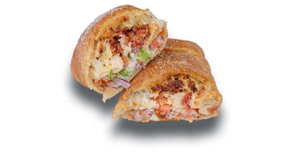 Chicken Ranch Calzone
 · Top seller. Ranch, grilled chicken, onion, green peppers, tomato, bacon, and our cheese mix.