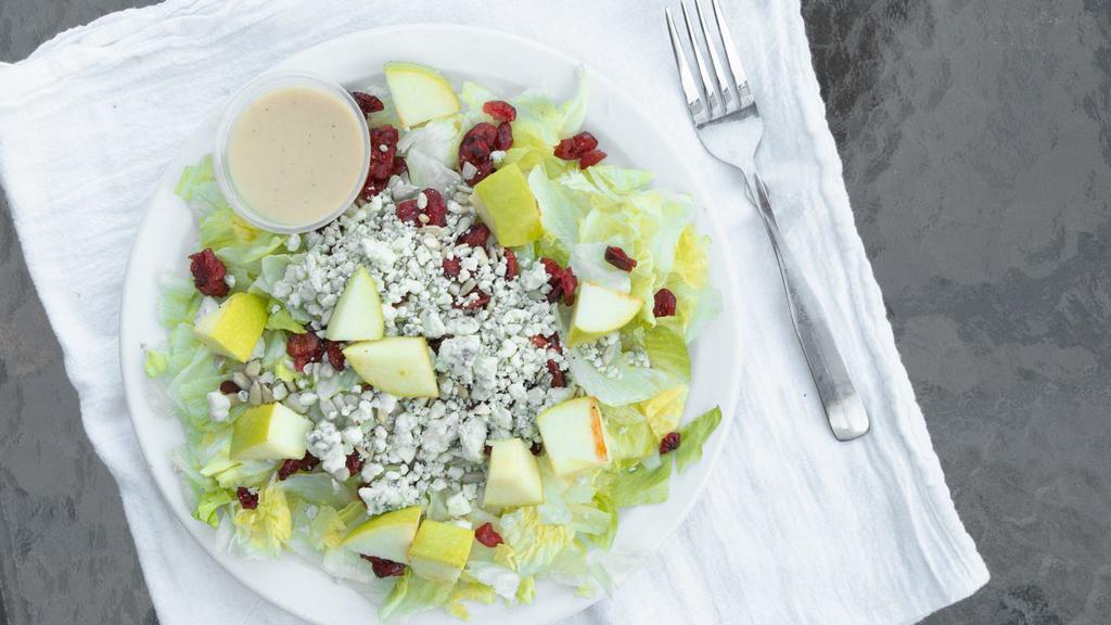 Apple Cranberry Salad · Crisp lettuce with apples, dried cranberries, sunflower seeds, bleu cheese crumbles, and an apple cider vinaigrette dressing. Add grilled or  crispy chicken for an additional charge.