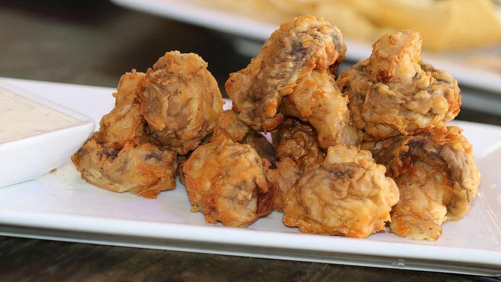 Breaded Mushrooms · Fresh Mushrooms tossed in our famous breading and fried