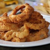 Tan O'Rings · Hand breaded - hommade onion rings served with chipotle ranch