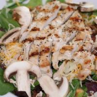Lips & Leaves · Our Famous hand breaded Chicken Lips atop a bed of spinach or spring mix, shredded cheese, t...
