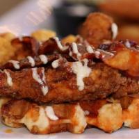 Chicken & Waffles · Crispy Belgium Waffle topped with Breaded Chicken, Hot Honey Sauce, Garlic Aioli and Crispy ...