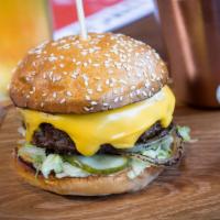 Big Mike Burger · Our signature burger, American cheese, charred onions, pickles, special sauce, iceberg lettu...