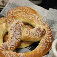 Pub Pretzels · Queso cheese and mustard sauce.