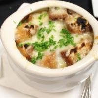 French Onion Soup · Homemade and Topped with melted cheese and Homemade croutons