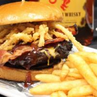 Smoked Bbq Whiskey · Cherrywood smoked bacon, aged cheddar, fried onion strings and fireball Bbq sauce.