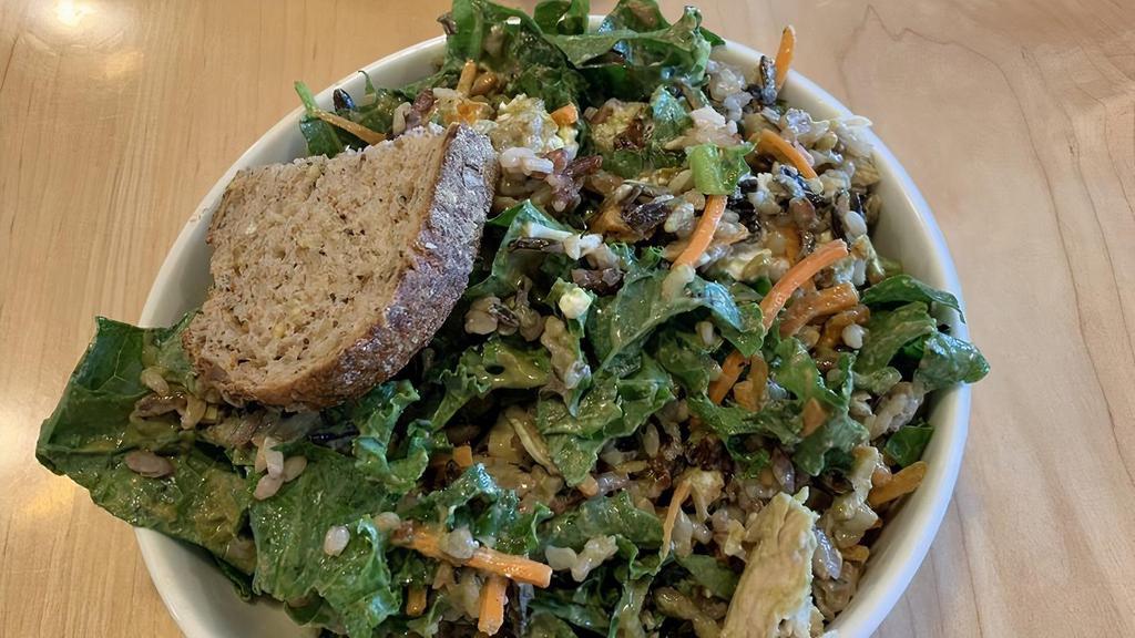 Popeye Bowl · Warm organic brown rice, spinach, kale, carrots, blistered tomatoes, local feta, grilled chicken, lemon drizzle, walnut pesto sauce.