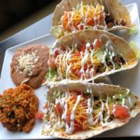 Americana Tacos · Ground Beef tossed with sweet Bell Peppers and traditional Chili spices.