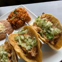 Chicken 3 Taco · Slow braised Shredded Chicken with Achiote and Ancho chile