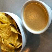 Queso & Chips · Blend of Oaxacan and Chihuahua Cheeses. All Latin cheese. Much lighter than a traditional Am...