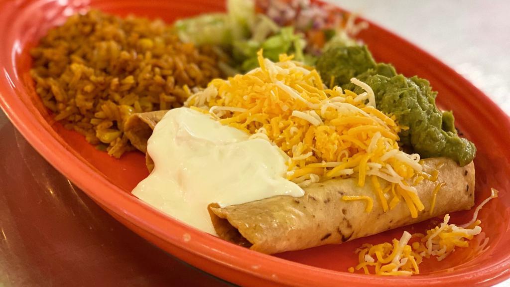 Four Rolled Taquitos · Shredded beef or shredded chicken served with pico de gallo, guacamole, lettuce, sour cream and rice on the side.