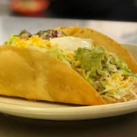 Taco Salad · Your choice of meat shredded beef, shredded chicken or ground beef. Served with rice, refrie...