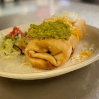 Chimichangas · Choice of meat asada, pork, shredded beef, shredded chicken or ground beef. On the inside be...