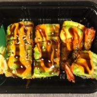 Monkey Roll · Inside: shrimp tempura, spicy salmon, and avocado. Outside: spicy salmon and avocado with sp...