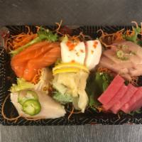 Sashimi Entrée · Fifteen pieces assorted raw fish.