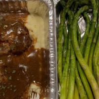 Meatloaf With Potatoes And Green Beans · Ground beef, veal, and pork, house seasoning, and roasted to perfection served with mashed p...
