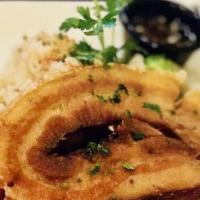 Lechon Kawali · Spiced deep fried pork belly served with rice.