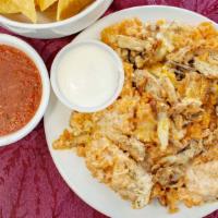 Chicken & Rice Lunch · So simple, so good! Just grilled chicken, rice, cheese, and sour cream.