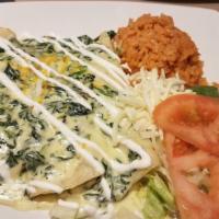 Chicken & Spinach Enchiladas · Three corn tortillas stuffed with chicken, spinach, sweet corn, then smothered with cheesy-s...