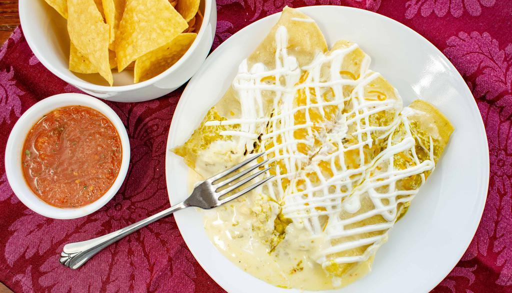 Lunch Enchiladas · Two enchiladas, chicken, ground beef, or cheese served with your choice of fresh-cut fries, beans, rice, or chicken tortilla soup. Add or substitute for cheese sauce for an additional charge.