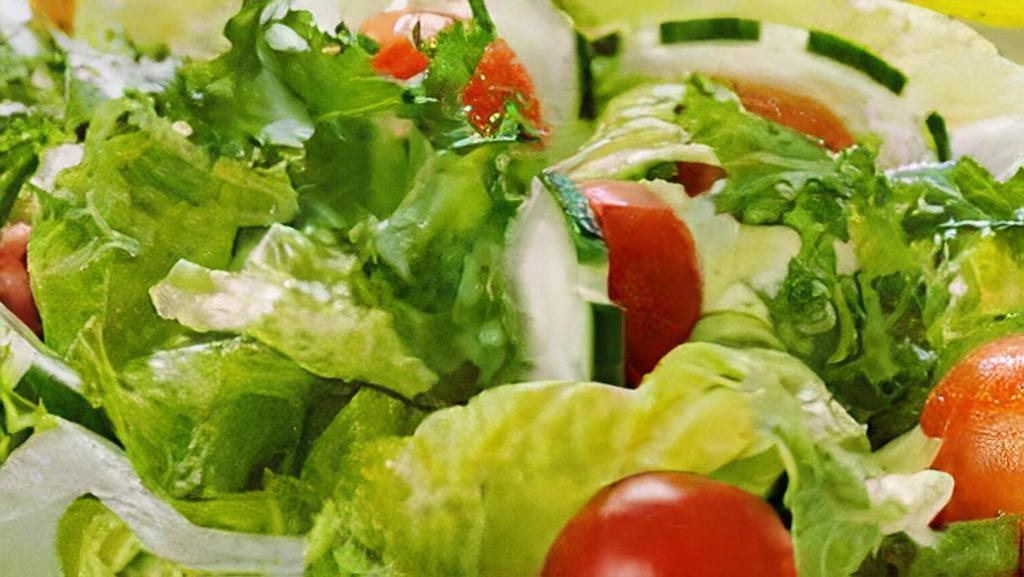 House Salad · Mixed greens, grape tomatoes, shredded carrots, diced cucumbers, red onion, Greek vinaigrette.