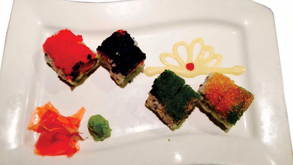 Four Seasons · Tuna, salmon, yellowtail, scallion, avocado roll with assorted tabiko on top.