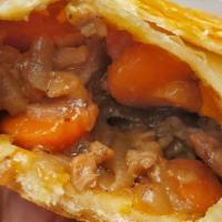 Steak & Guinness Pie · Tender juicy steak, carrots and sweet caramelized onions in a rich savory sauce made with Gu...