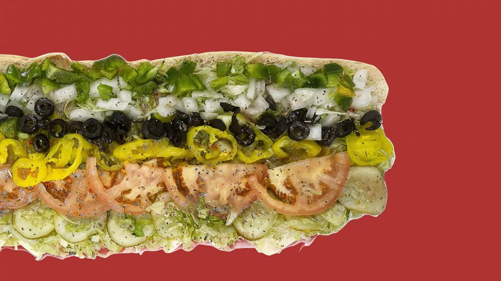 Half Veggie Sub (8 In) · White American Cheese, Lettuce, Tomatoes, Banana Peppers, Black Olives, Green Peppers, Pickles, Salt, Pepper, Oregano & Ricky’s Sub Sauce.