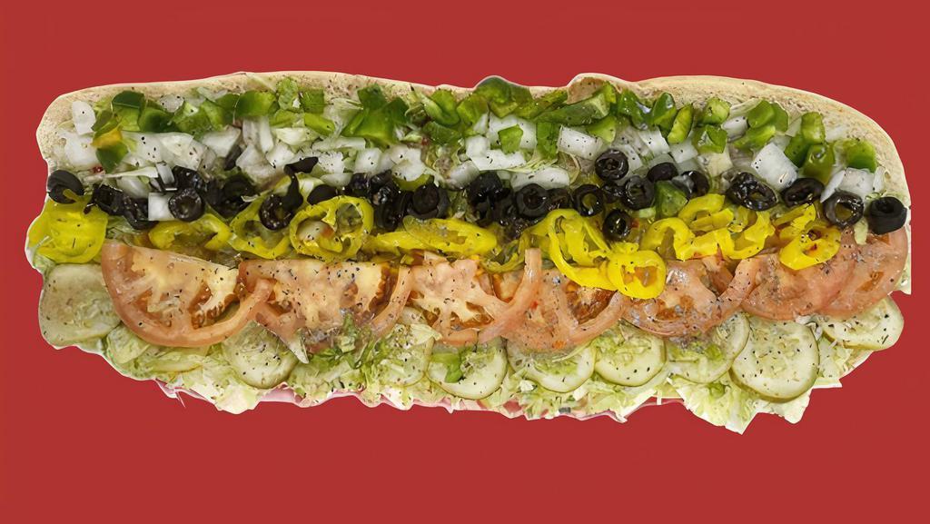 Whole Veggie Sub (16 In) · White American Cheese, Lettuce, Tomatoes, Banana Peppers, Black Olives, Green Peppers, Pickles, Salt, Pepper, Oregano & Ricky’s Sub Sauce.