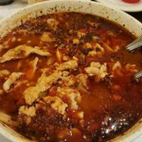 Szechuan Chili Pork Bowl水煮肉片 · Hot and spicy.