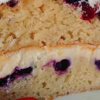 Lemon Berry Mascarpone Cake · Our Lemon Berry Mascarpone Cake is a moist cake loaded with sweet blueberries. In between ea...