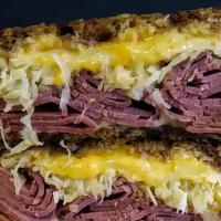 Reuben · A classic we perfected with lean corned beef, sauerkraut and 1000 Island dressing on marble ...