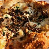 Truffle Pizza · Smoked mozzarella shiitake mushrooms with organic truffle oil.