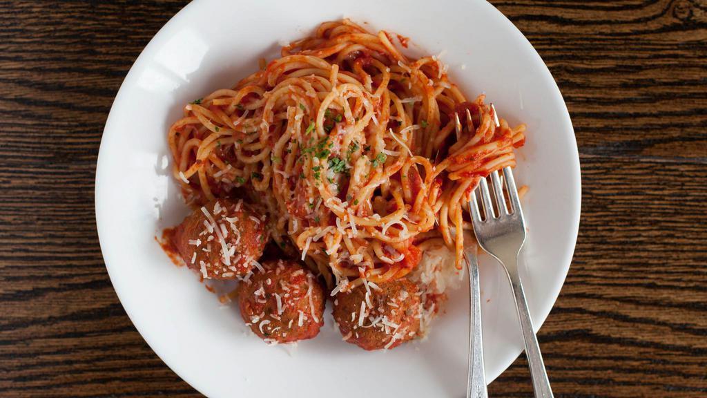 Spaghetti Con Polpette · Beef Meatballs, Tomato, Herbs, Parmigiano Reggiano