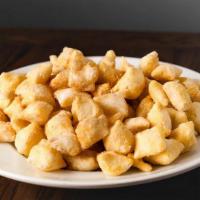 Dough Nuggets · 1/2 lb. topped with powdered sugar.