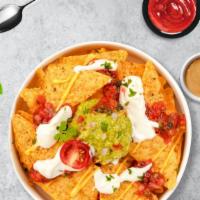 Lock And Loaded Nachos · Warm nachos topped with cheese, chili meat sauce, tomatoes, jalapeños, and sour cream..