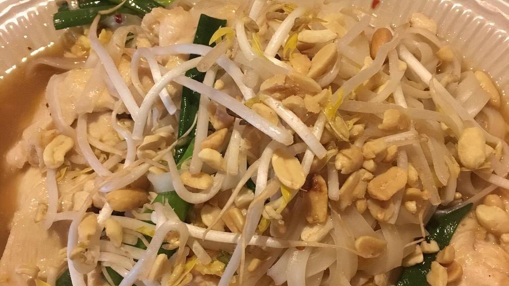 Chicken Pad Thai · Rice noodle stir-fried with bean sprouts, eggs, green onions and carrots with your choice of meat and topped with crusted peanuts.