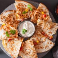 Chicken Quesadilla · A blend of oaxaca cheese, provolone and mozzarella, Mediterranean grilled chicken, grilled d...
