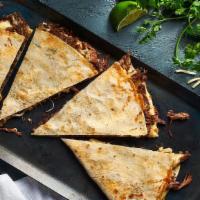Beef Chorizo Quesadilla · A blend of Oaxaca, Provolone & Mozzarella & Sharp Cheddar cheese mixed with our house scratc...