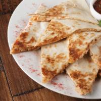 Beef Quesadilla · A blend of Oaxaca cheese, provolone and mozzarella, Mediterranean grilled skirt steak, grill...