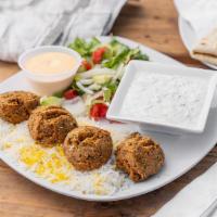 Falafel Combo Platter · Long grain rice, farmer's salad, pita bread, a choice of protein and a choice of dip Substit...