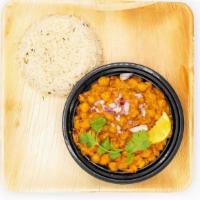 Chana Masala · Classic vegetarian indian recipe featuring chickpeas, tomatoes & spices