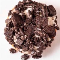 Cookies + Cream · Our traditional yeast donut topped with our white chocolate glaze and crushed Oreo cookies.