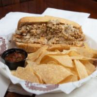 Chicken Cheesesteak · Our regular chicken cheesesteak with grilled onions and melted mozzarella cheese, tucked int...