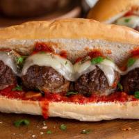 Meatball Sub · Served on French Bread. Three Meatballs with Provolone Cheese Topped with Marinara sauce.