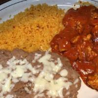 Pollo Chipotle · Chicken strips cooked with special chipotle sauce and served with Mexican rice, fried beans ...