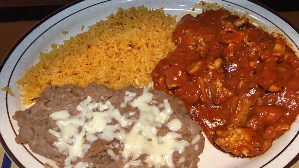 Pollo Chipotle · Chicken strips cooked with special chipotle sauce and served with Mexican rice, fried beans or black beans and three flour tortillas.