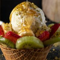 Ashta Fruit Bowl  · Ashta ice cream with fresh fruits , pistachio and honey