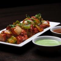 Chilli Chicken · Boneless chicken marinated in ginger garlic paste, chilli sauce, white pepper, soy sauce, an...