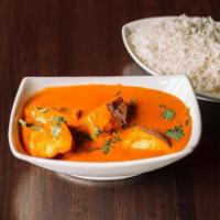 Chicken Tikka Masala · Marinated boneless chicken cooked in tomato based sauce, cream, herbs, and spices. Served wi...